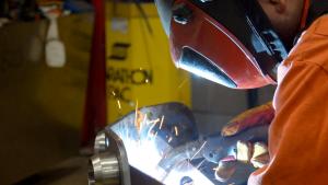Image of a worker welding